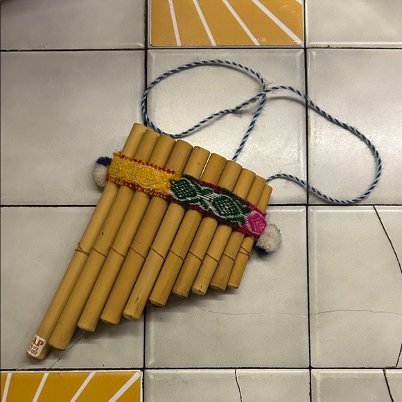 Handcrafted Bamboo Pan Flute with Colorful Accents - Picture 1 of 2